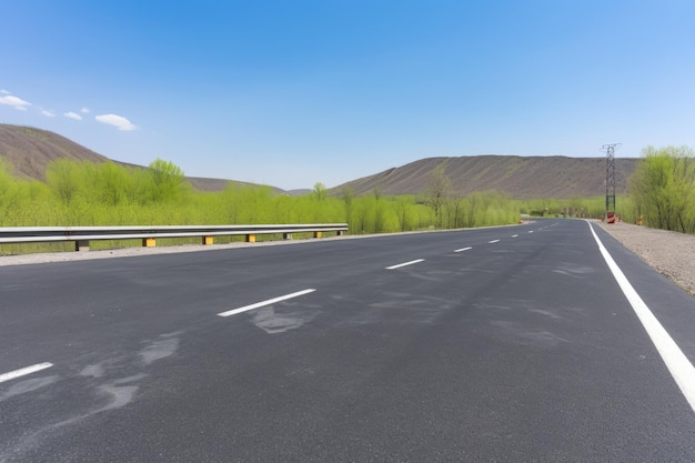 Photo rural road with a view of the mountainside