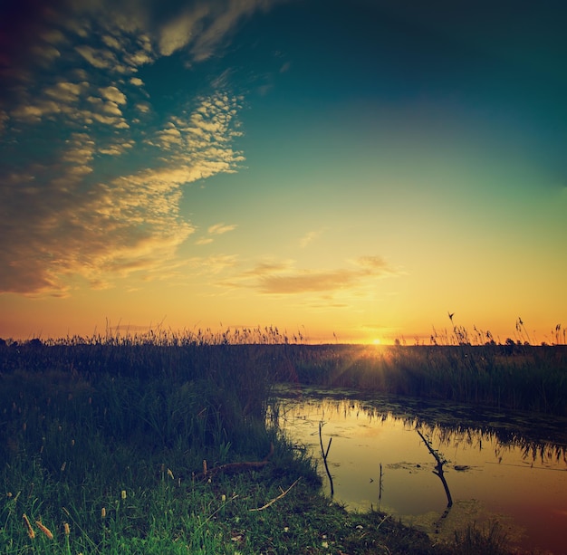 Rural summer sunrise landscape with river etro vintage style