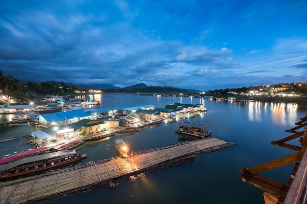 Rural village on the water at twilightsangkhlaburi kanchanaburi thailand