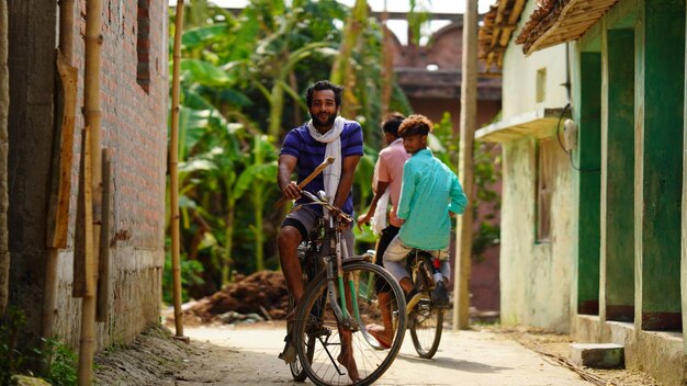 Rural young boy on cycle