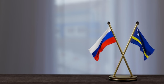 Russia and Curacao flags on table Negotiation between Curacao and Russia on little blur background 3D work and 3D image