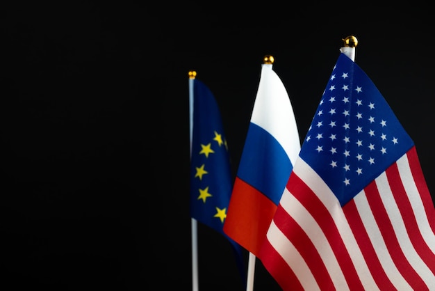 Russia Europe Union and USA flag on a black background Crisis sanctions concept World conflict