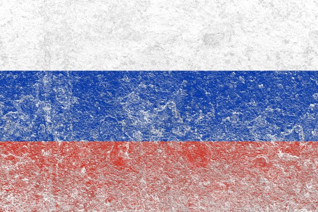 Russia flag painted on a damaged old concrete wall surface