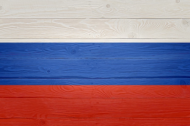 Photo russia flag painted on old wood plank background