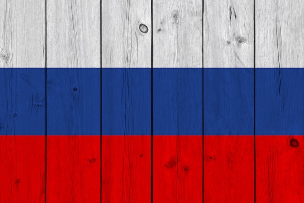 Russia flag painted on old wood plank