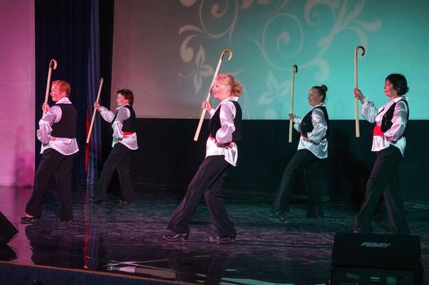 Russia, Gatchina, October 14, 2022 Elderly women dance on stage