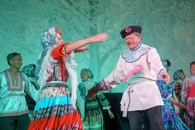 Russia, Gatchina, October 14, 2022 Pensioners perform folk dances at the festival