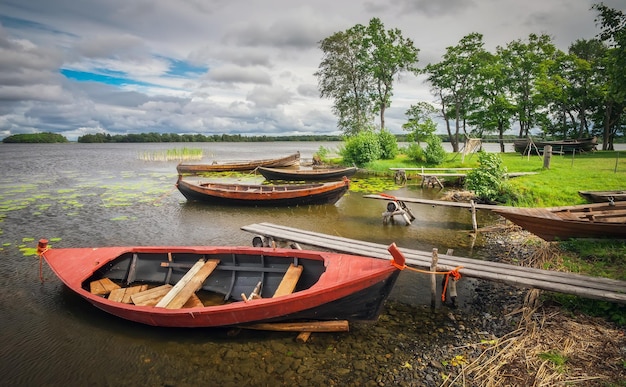 Russia Karelia Kizhi Island Boats on the shore of lake Onega