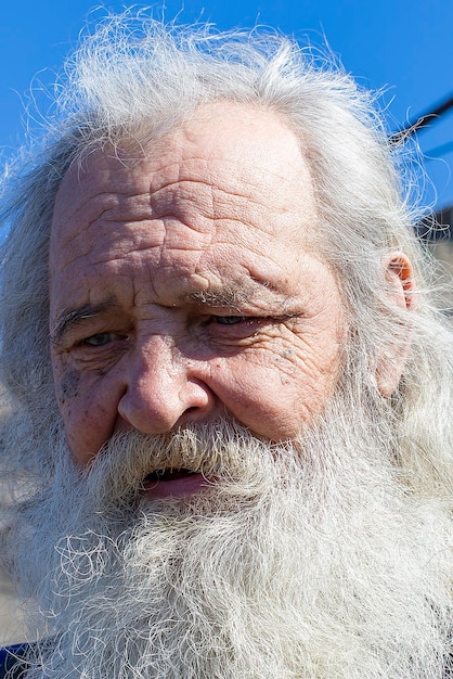 Russia Moscow 14 April 2018 year grandfather with a long a whitehaired beard the lone old ageeditorial