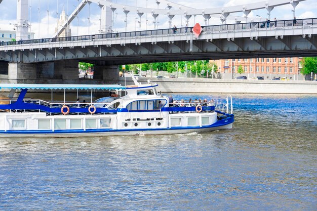 Russia Moscow May 24 2021 boat on the Moscow River under the Crimean Bridge