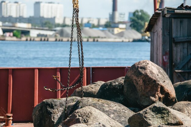 Russia St Petersburg June 2022 Clearing the river bottom of large stones