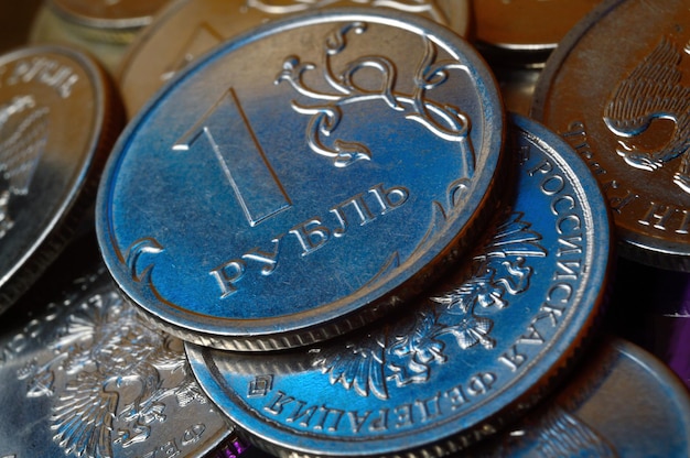 Russian 1 ruble coin is highlighted in blue. close-up.