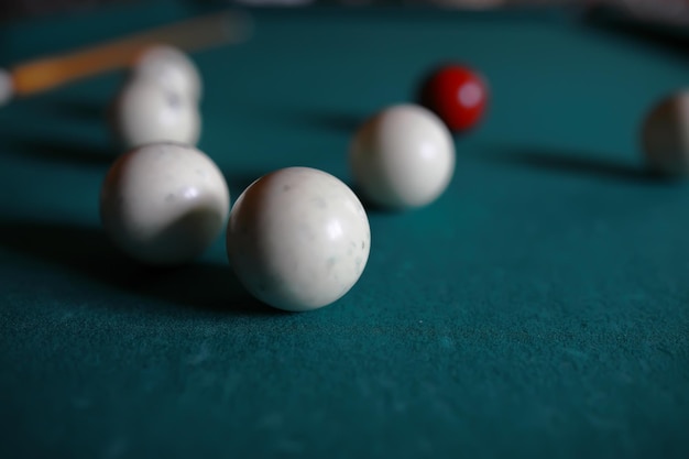 Russian billiard balls cue triangle chalk on a table green
cloth copy space