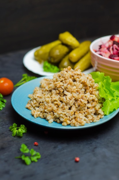 Russian buckwheat porridge near greens proper nutrition vegetarian