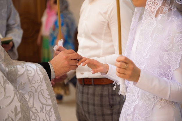 Russian church. bride and groom in the church during the
christian wedding ceremony.