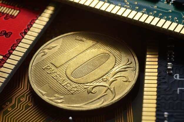 Russian coin with a face value of 10 rubles lies among the microcircuits the concept of the digital economy of Russia