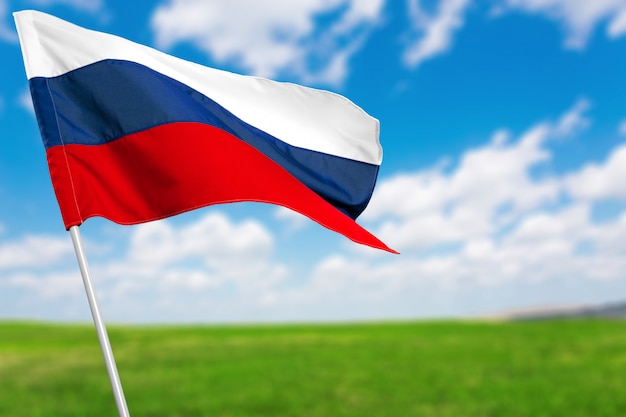 Russian flag against blue sky