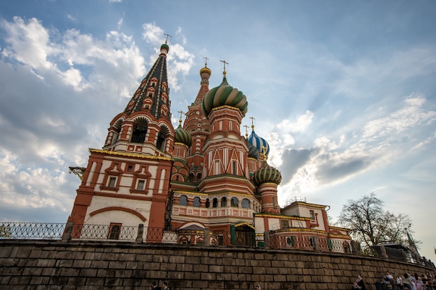 Russian and foreign tourists visit the church on holiday.