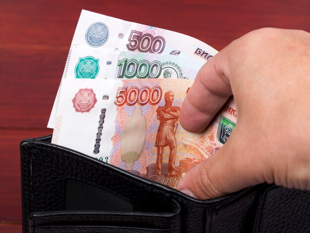 Russian money  ruble in the black wallet