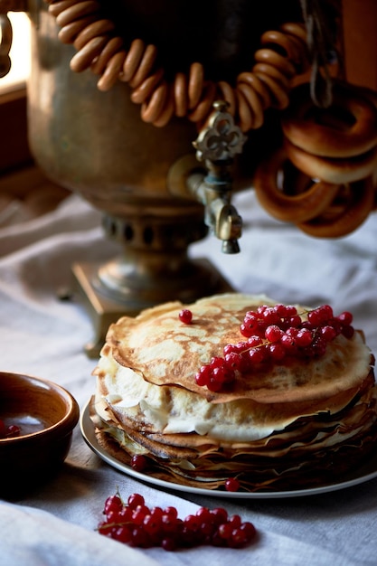 Russian old samovar with a bunch of sheepThe tradition of tea drinking