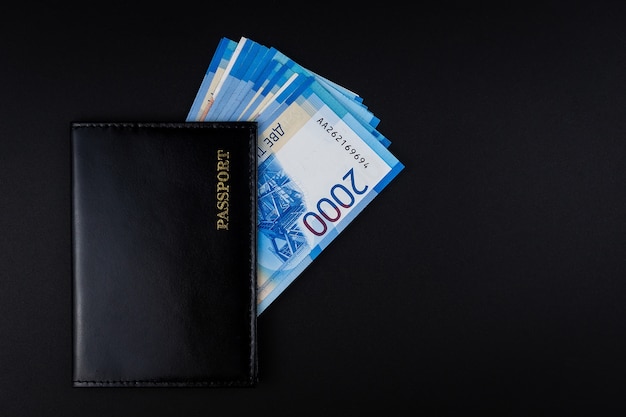 Russian passport and rubles banknotes