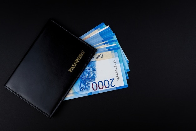 Russian passport and rubles banknotes