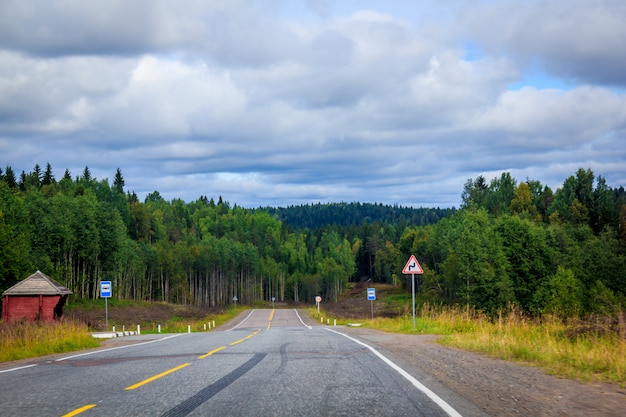 Russian roads in Karelia. Travel by road. Asphalt road. Smooth road