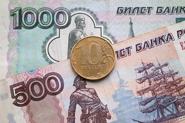 写真 ロシア・ルーブル硬貨と紙幣の背景