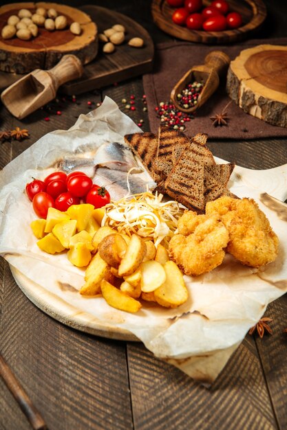 Russian snack set with herring and vegetables