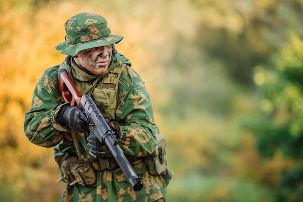 Russian soldier in the battlefield with a rifle