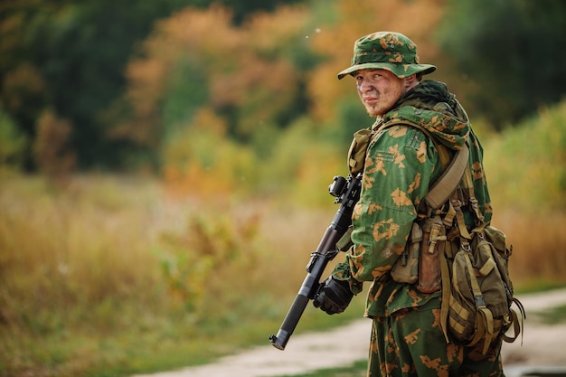 Russian soldier in the battlefield with a rifle