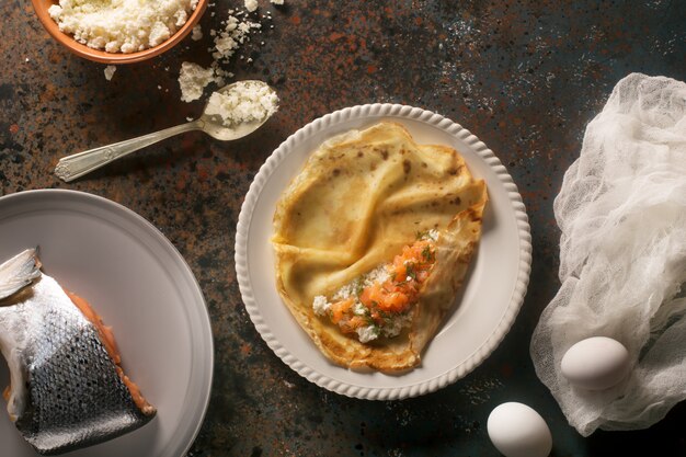 Photo russian-style pancakes with lox