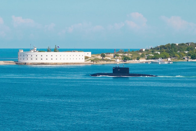 Russian submarine go out from the bay.