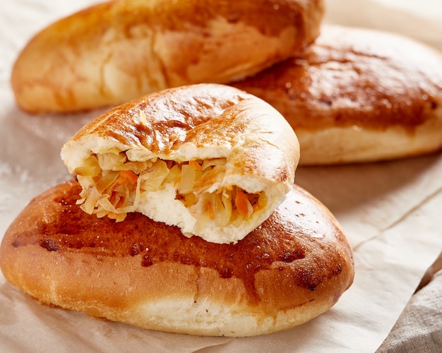 Russian traditional food. hotcakes with fried cabbage