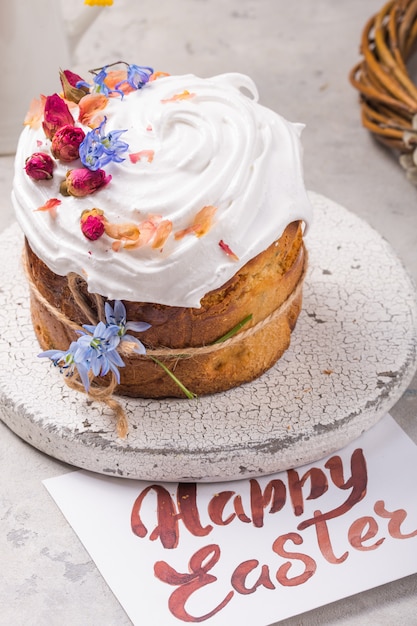 Russian and Ukrainian Traditional Kulich or Brioche on a light stone