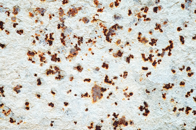 Rust on the surface of metals, with paint residues