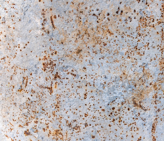 Ржавчина на поверхности старой железной пластины с цементом. ухудшение стали, распада и гранж текстуры фона
