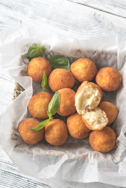 Rustic bowl of arancini