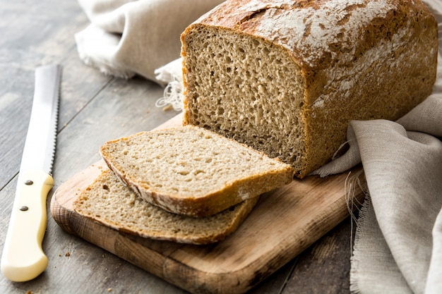 Rustic bread on wooden table