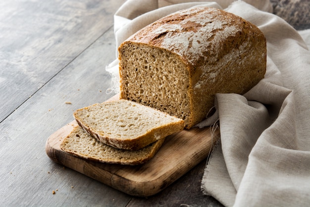 Rustic bread on wooden table