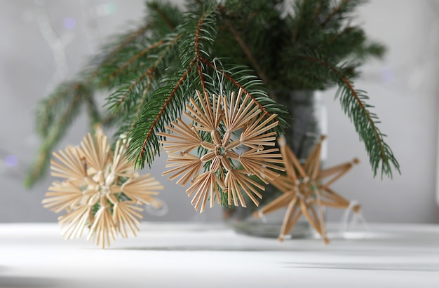 Rustic christmas straw toys on new year eve