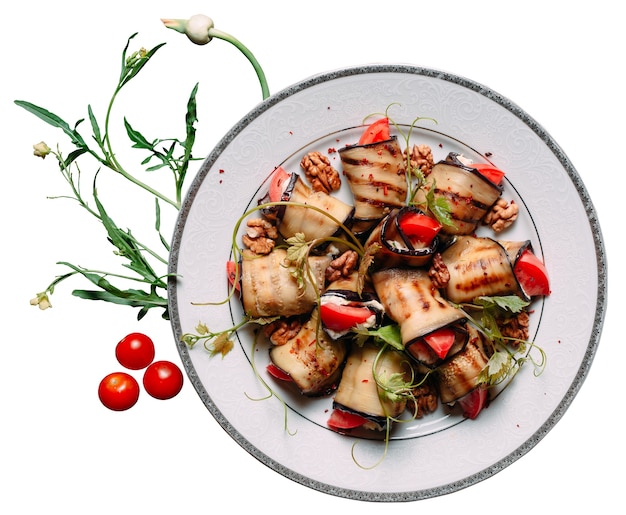 Rustic fried stuffed eggplant with cheese and tomatoes isolated on white background.