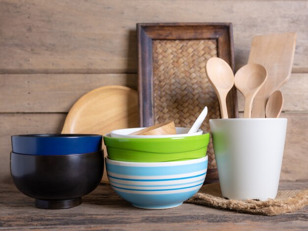 Rustic kitchenware against white wooden wall