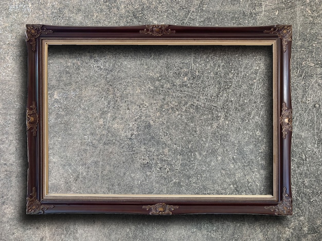 Photo rustic picture frame on cement wall