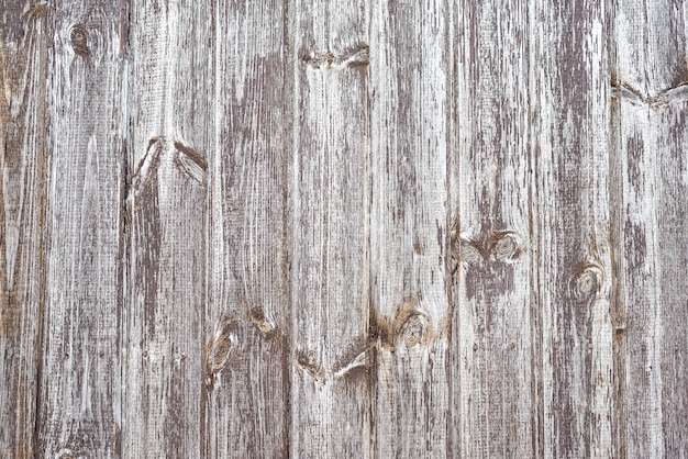 Rustic plank fence brown old bark wood textured backdrop