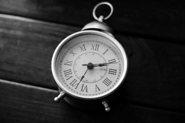 rustic pocket clock on black and white