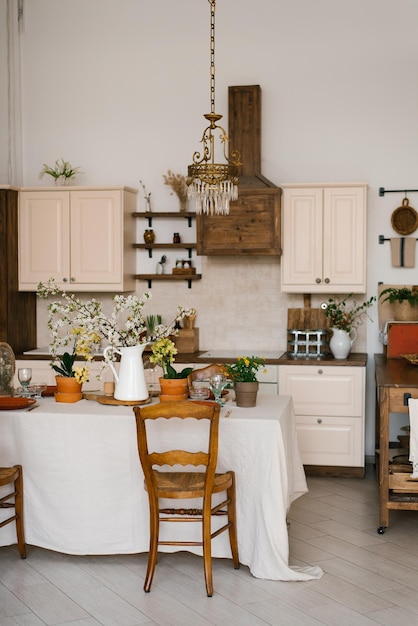 Photo rustic scandinavianstyle kitchen with spring flowers in the decor