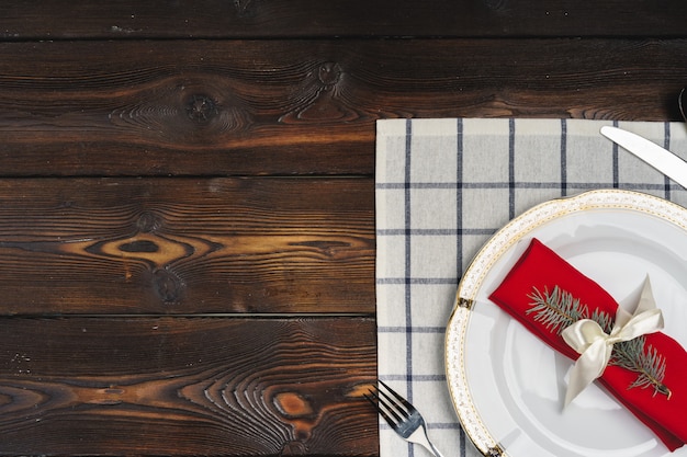 Rustic style table setting on wooden surface
