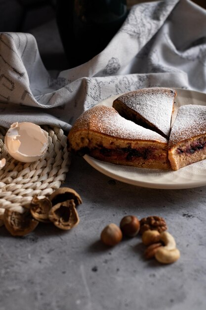 rustic sweet cake for breakfast with honeysuckle and nuts. High quality photo