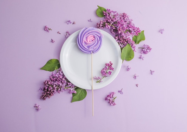 rustic table setting with lilac flowers on light table  romantic dinner